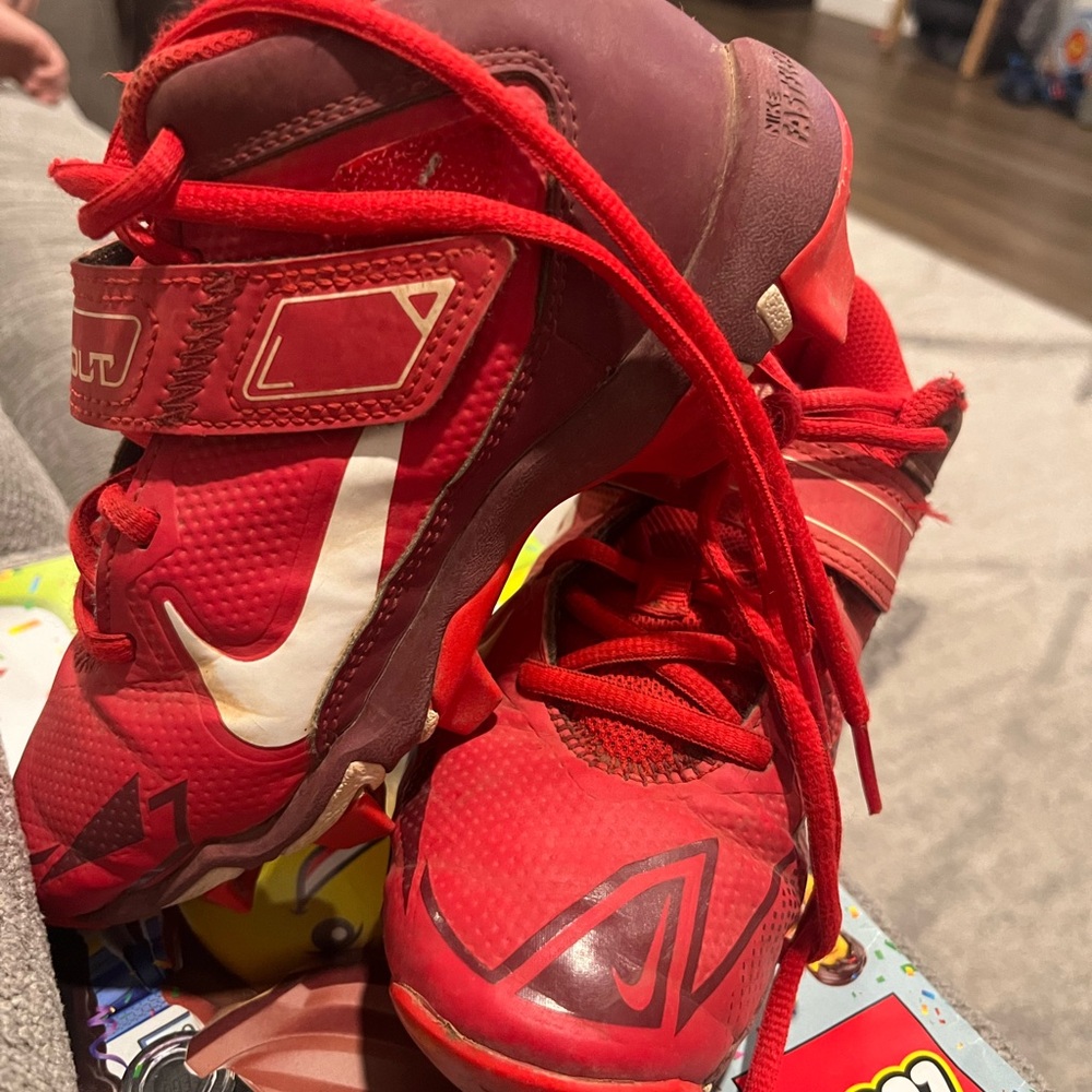 Nike Red Trout cleats 7/10 great for this age can Velcro the laces huge help